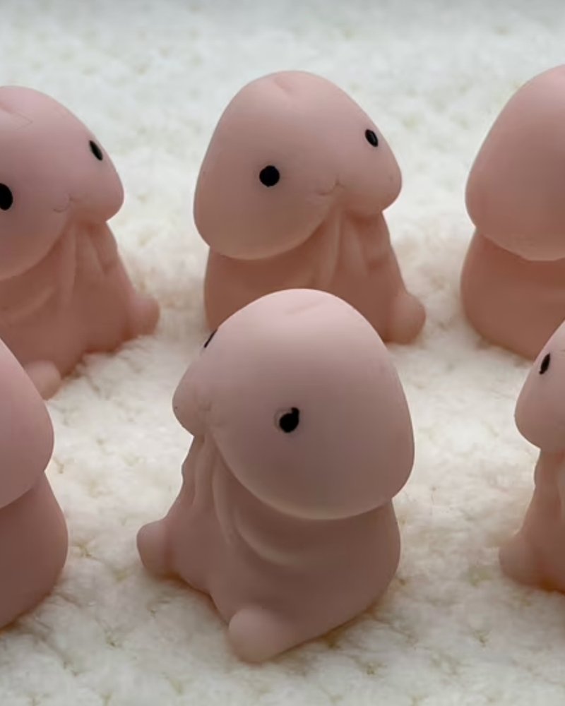 Six pink novelty squishy toys with little dot eyes